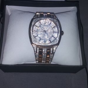 Rose gold iced out bulova